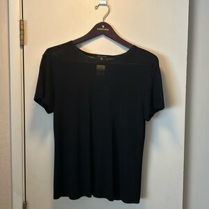 Semi sheer rayon, short sleeved top. Dressy. Hardly worn 😊. Very good condition.